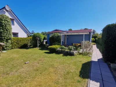 Ein Garten an der Unterkunft Ferienhaus Seemann- strandnah und hundefreundlich mit sicherem Garten