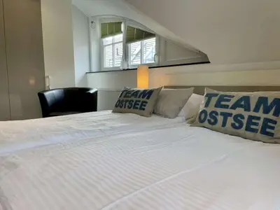 Ein Bett oder Betten in einem Zimmer der Unterkunft Holiday home in Zingst with swimming pool