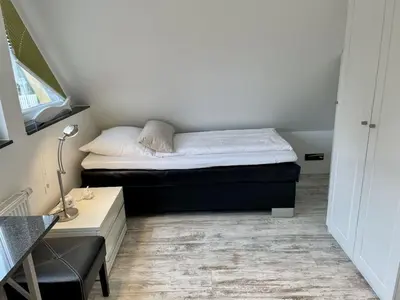 Ein Bett oder Betten in einem Zimmer der Unterkunft Holiday home in Zingst with swimming pool