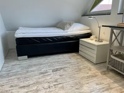 Ein Bett oder Betten in einem Zimmer der Unterkunft Holiday home in Zingst with swimming pool