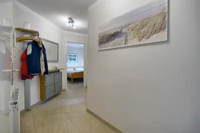 Ein Bett oder Betten in einem Zimmer der Unterkunft Strandstrasse 55 Wohnung Mücke