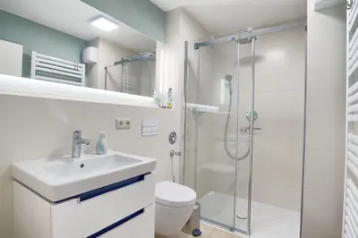 Ein Badezimmer in der Unterkunft Strandstrasse 55 Wohnung Mücke