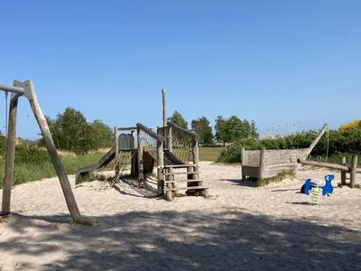Ein Kinderspielbereich in der Unterkunft Möwennest
