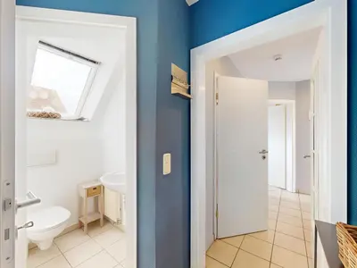 Ein Badezimmer in der Unterkunft Ferienwohnung Blau & Sand