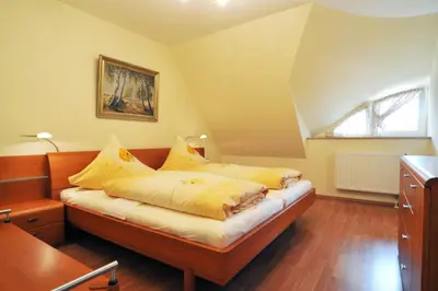 Ein Bett oder Betten in einem Zimmer der Unterkunft -