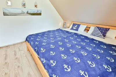 Ein Bett oder Betten in einem Zimmer der Unterkunft Fewo Rabe rechts Fewo Nr 2