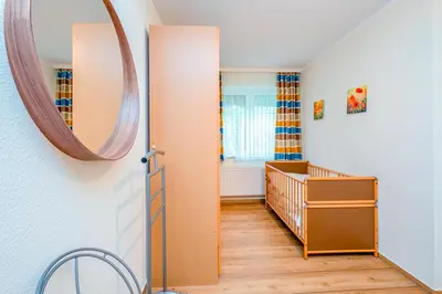 Ein Bett oder Betten in einem Zimmer der Unterkunft Haus Kranich 6, Fewo Nr 27