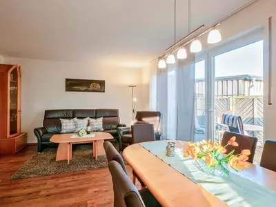 Ein Sitzbereich in der Unterkunft Haus Regenbogen Fewo Nr 2