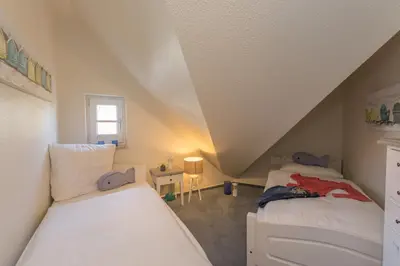 Ein Bett oder Betten in einem Zimmer der Unterkunft Ferienwohnung Hustadt