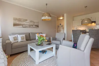 Ein Sitzbereich in der Unterkunft Ferienwohnung Hustadt