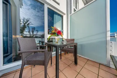 Ein Balkon oder eine Terrasse in der Unterkunft Luv & Lee BalticLoft - 150m zum Strand mit Sauna, Kamin, Balkon