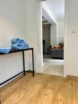 Ein Bett oder Betten in einem Zimmer der Unterkunft Wiesenau 1 Ferienwohnung in Prerow by Restaurant Wiesenau