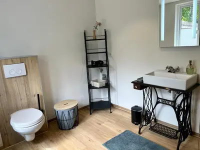 Ein Badezimmer in der Unterkunft Wiesenau 1 Ferienwohnung in Prerow by Restaurant Wiesenau