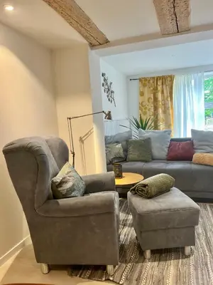 Ein Sitzbereich in der Unterkunft Wiesenau 1 Ferienwohnung in Prerow by Restaurant Wiesenau