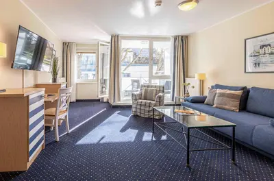 Ein Sitzbereich in der Unterkunft Ferienwohnung Deichperle - Ihr idyllischer Rückzugsort an der Ostsee in Zingst