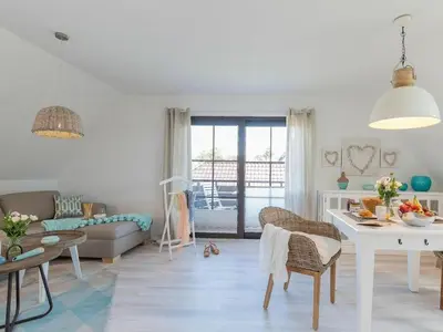 Ein Sitzbereich in der Unterkunft House on the beach 5