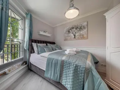 Ein Bett oder Betten in einem Zimmer der Unterkunft Right by the sea with sauna