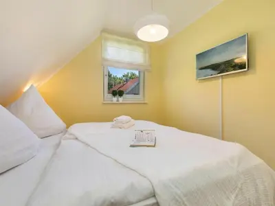 Ein Bett oder Betten in einem Zimmer der Unterkunft Holiday apartment with 1 bedroom
