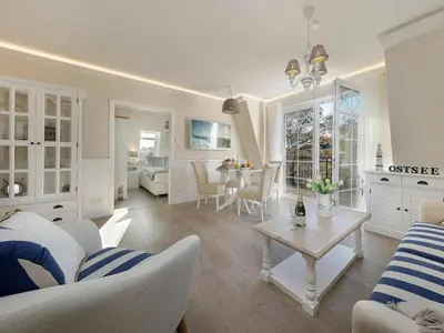 Ein Sitzbereich in der Unterkunft Villa Strandblick 12