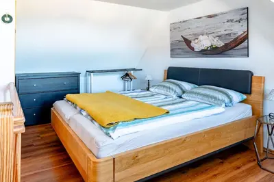 Ein Bett oder Betten in einem Zimmer der Unterkunft 