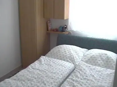 Ein Bett oder Betten in einem Zimmer der Unterkunft Apartment Strandnahe Wohnung mit Terrasse und Parkplatz by Interhome