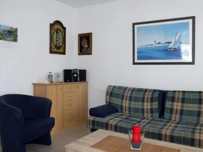 Ein Sitzbereich in der Unterkunft Apartment Strandnahe Wohnung mit Terrasse und Parkplatz by Interhome