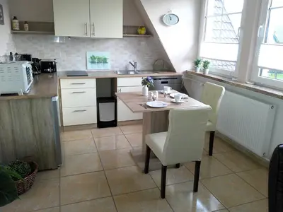 Küche/Küchenzeile in der Unterkunft Apartment Geräumige Ferienwohnung in Zingst mit Terrasse by Interhome