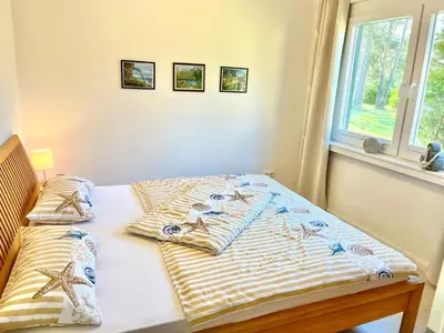 Ein Bett oder Betten in einem Zimmer der Unterkunft Holiday Home Wiesenblick 8 by Interhome