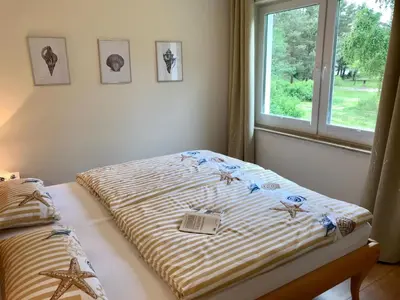 Ein Bett oder Betten in einem Zimmer der Unterkunft Holiday Home Wiesenblick 6 by Interhome