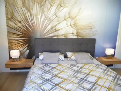 Ein Bett oder Betten in einem Zimmer der Unterkunft Holiday Home Wiesenblick 5 by Interhome