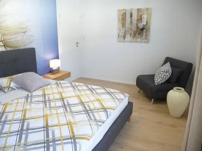 Ein Bett oder Betten in einem Zimmer der Unterkunft Holiday Home Wiesenblick 5 by Interhome
