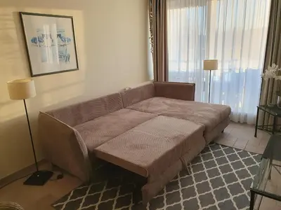 Ein Bett oder Betten in einem Zimmer der Unterkunft Am Zingster Strand