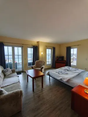 Ein Bett oder Betten in einem Zimmer der Unterkunft Pension Hafenblick