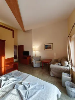 Ein Bett oder Betten in einem Zimmer der Unterkunft Pension Hafenblick