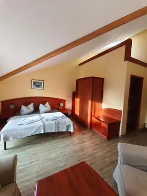 Ein Bett oder Betten in einem Zimmer der Unterkunft Pension Hafenblick