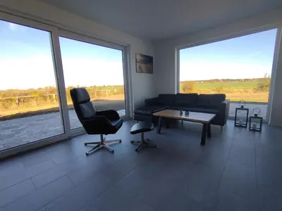 Ein Sitzbereich in der Unterkunft Ferienhaus Ostseebrise