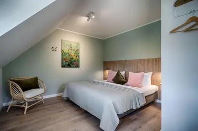 Ein Bett oder Betten in einem Zimmer der Unterkunft Wiesenwind