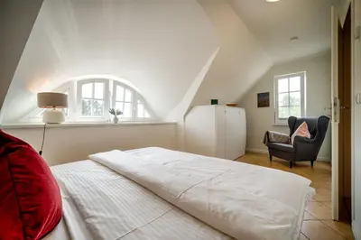 Ein Bett oder Betten in einem Zimmer der Unterkunft Hafenbrise