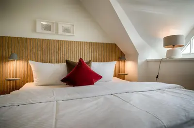Ein Bett oder Betten in einem Zimmer der Unterkunft Hafenbrise