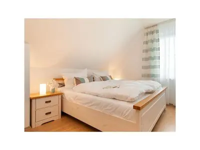 Ein Bett oder Betten in einem Zimmer der Unterkunft Holiday home in Zingst with swimming pool
