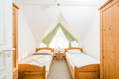 Ein Bett oder Betten in einem Zimmer der Unterkunft Kapitänsgarten, Fewo Nr 7