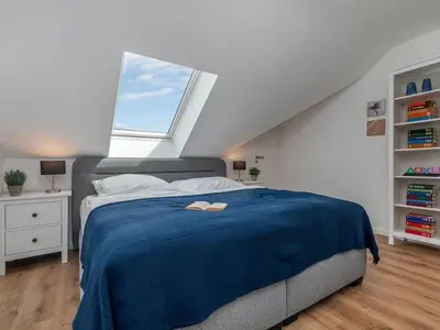 Ein Bett oder Betten in einem Zimmer der Unterkunft Suite 7 Wave Game