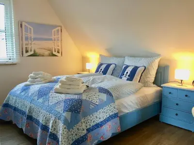 Ein Bett oder Betten in einem Zimmer der Unterkunft Holiday Home Seeschwalbe Helga by Interhome