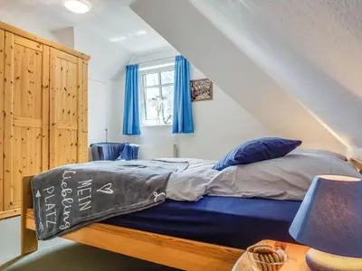 Ein Bett oder Betten in einem Zimmer der Unterkunft Sonneneck Birkenstraße 11c