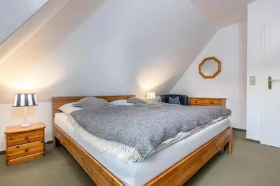 Ein Bett oder Betten in einem Zimmer der Unterkunft Sonneneck Birkenstraße 11c