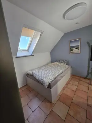 Ein Bett oder Betten in einem Zimmer der Unterkunft Fewo LucGa
