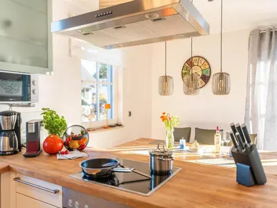 Küche/Küchenzeile in der Unterkunft Ferienhaus Haubenlerche, Fuhlendorf