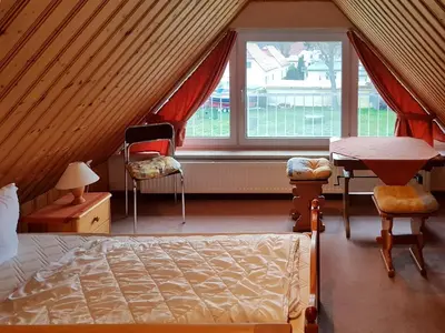 Ein Bett oder Betten in einem Zimmer der Unterkunft An der Sonnenwiese 2