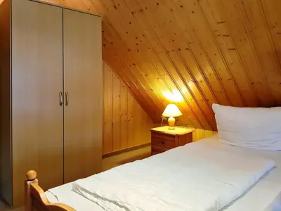 Ein Bett oder Betten in einem Zimmer der Unterkunft An der Sonnenwiese 2
