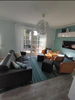 Ein Sitzbereich in der Unterkunft Lindenstr 32 a 